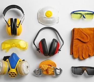 Flat lay composition with safety equipment on white background
